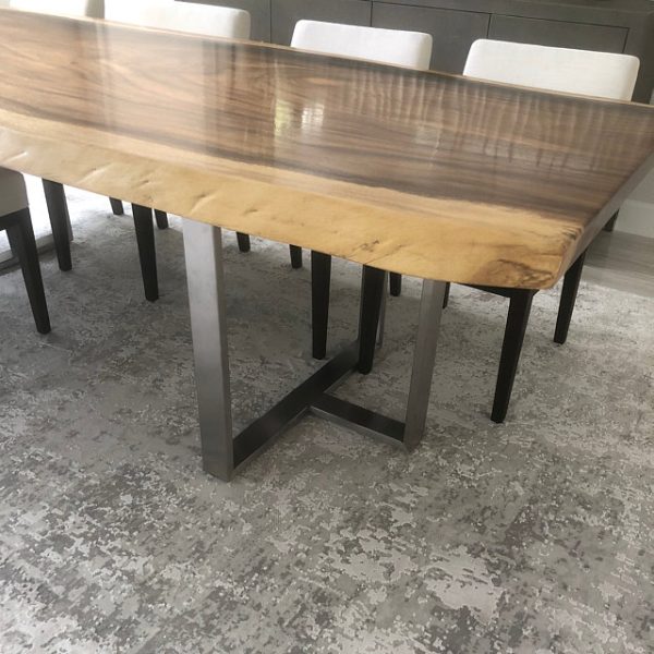 Brushed Stainless T-Shaped Legs on a Live Edge Wood Dining Table
