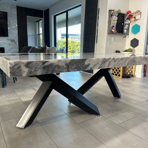 Abstract Style Metal Table Base With Heavy Stone Top